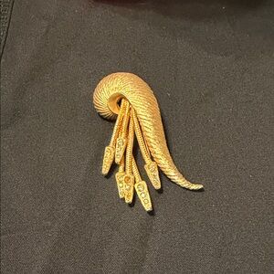 Elegant Gold Brooch with Crystal Accents